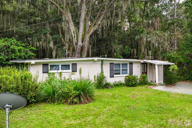 Cresthill mid-century modern homes blend harmoniously into surrounding greenery.