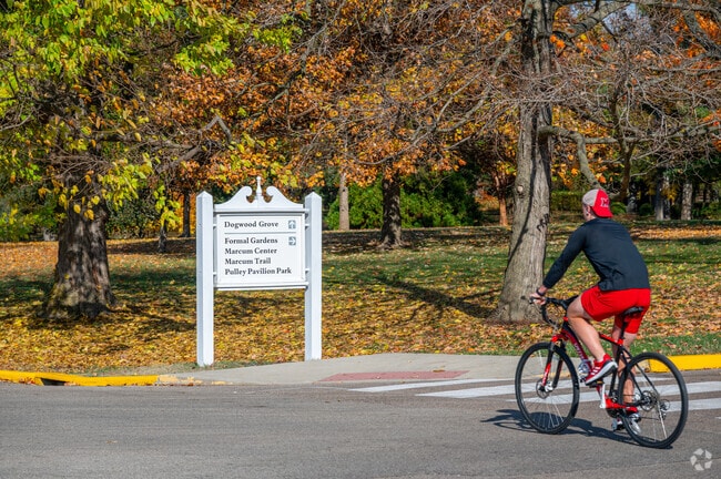 This cyclist takes advantage of a sunny day to visit Conrad Formal Gardens.