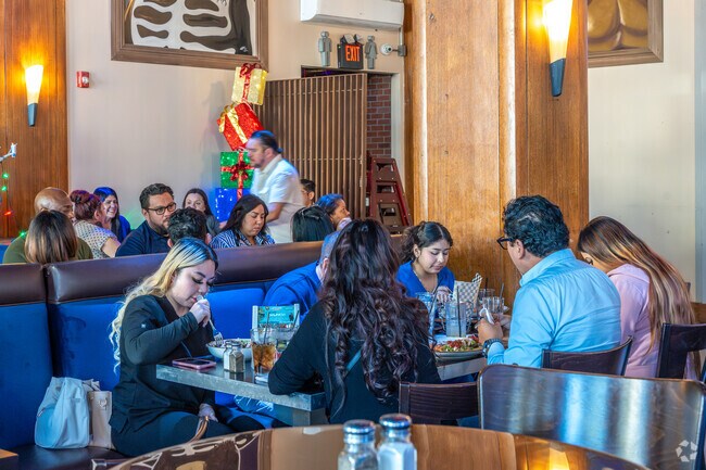 Luchador Kitchen offers a warm and inviting space to enjoy delicious Mexican food.