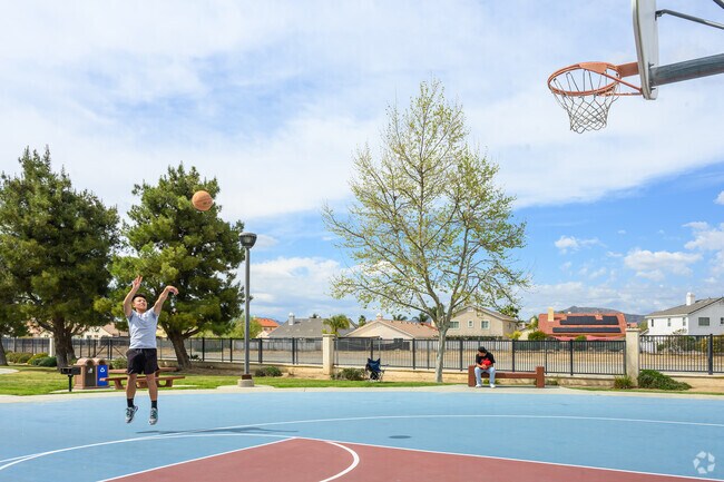 Shoot some hoops at Vista Lomas Park's basketball court in Victoriano.