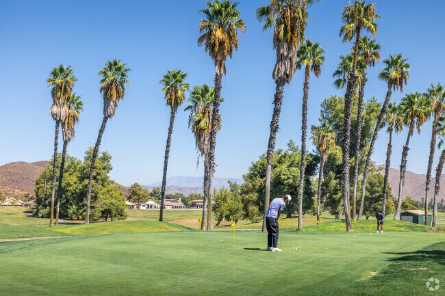 Work on your short game at Menifee Lakes Country Club golf course near Heritage Lake.