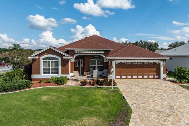 Village of Amelia homes are set on lush green lots.