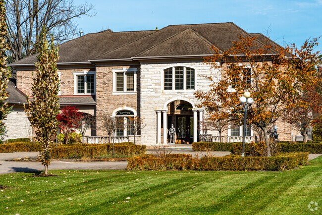 Colonial style homes in Bingham Farms can be found on secluded wooded lots.