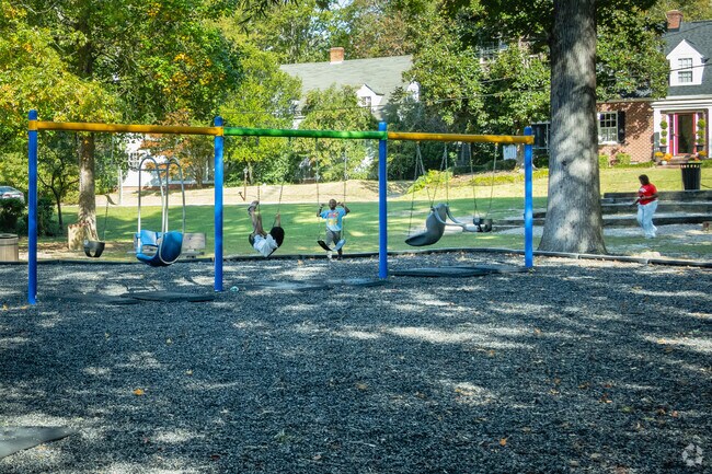 Children enjoy playing at the swings at Timrod Park in Green Acres.