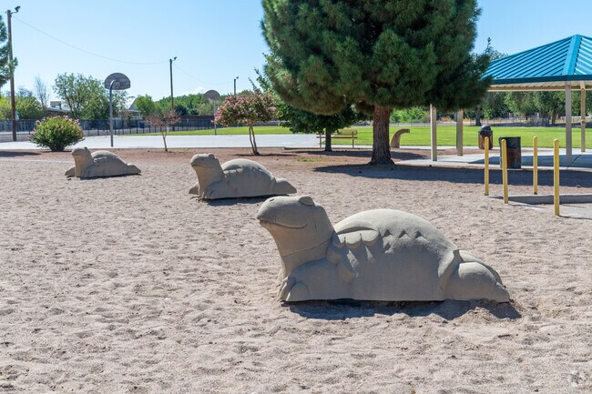 An array of amenities are found  Tortugas Park from a playground, playing fields and more.