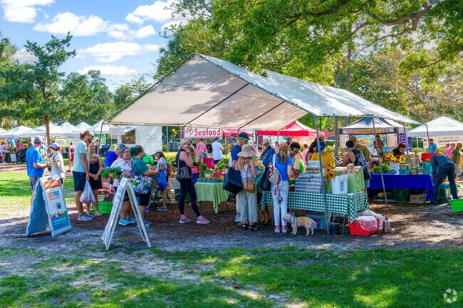 A line forms to get local produce at the Winter Park Farmer's Market.