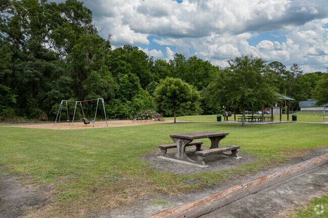 Sterling Park is a small community park featuring a playground and outdoor seating.