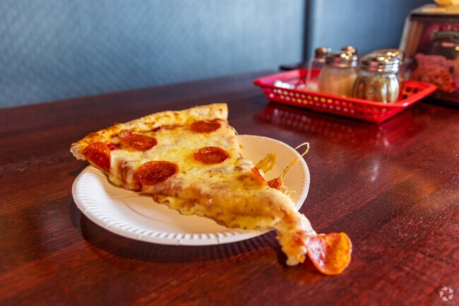 Hot slices are served at Roseti's Pizza.