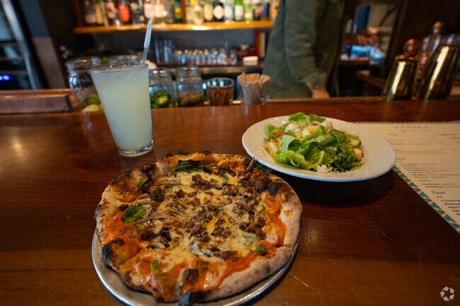 Grab a delicious pizza from the popular A Tavola Bar in Madeira.