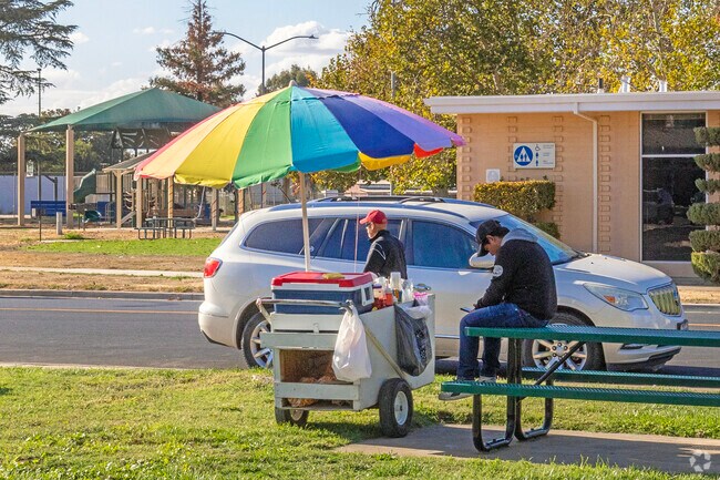 Vendors can be found offering snacks along the streets of Le Grand.