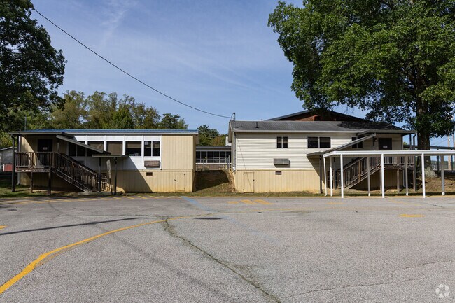 Teachers greet students with smiles each day at Shoals Elementary School.