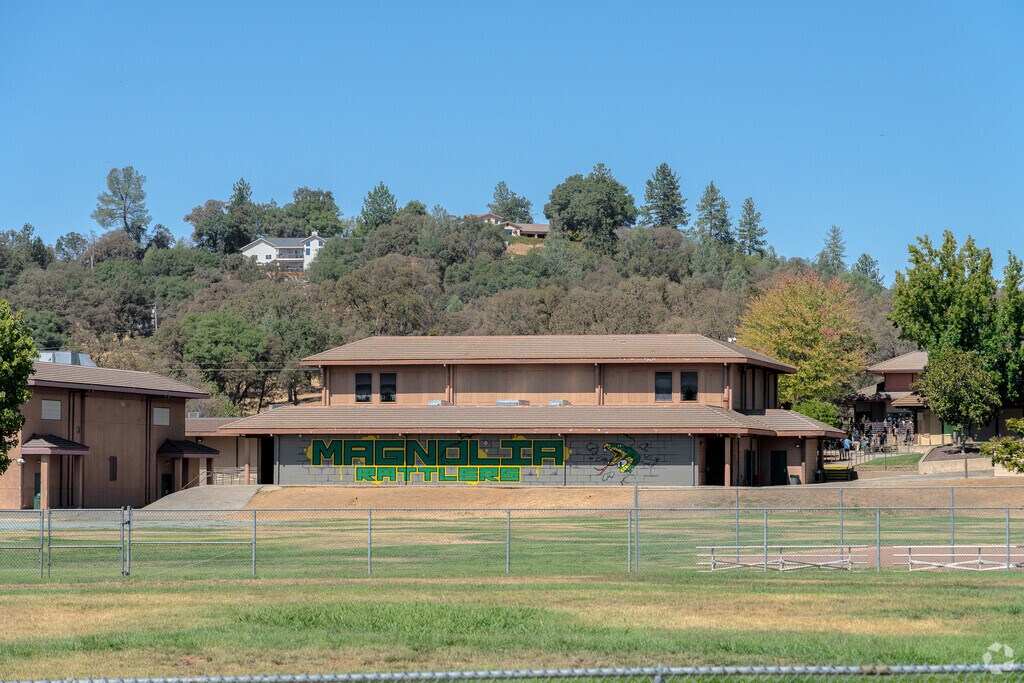 The Magnolia School painting can be seen from the main road.