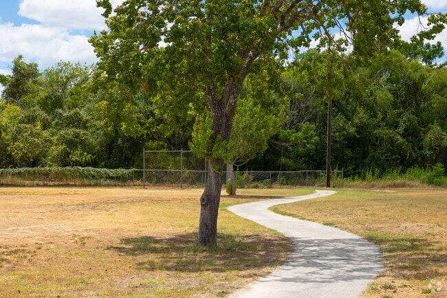 Enjoy peaceful walks on the trails at Vernon G. Schimel Memorial Park, surrounded by nature and community spirit.