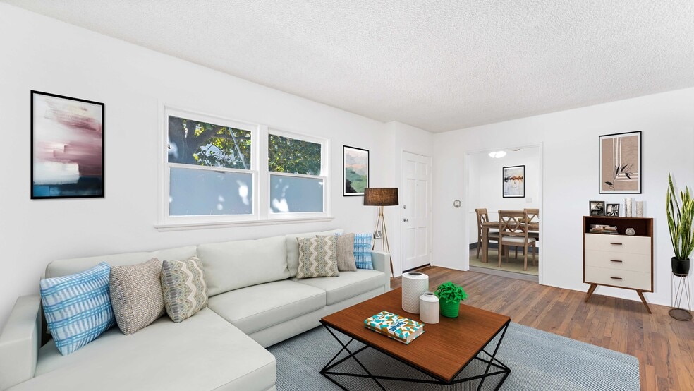 Digitally staged living room and dining room