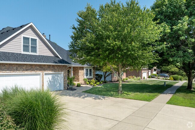 Piper Glen's modern homes line the winding streets, shaded by the foliage of oaks.