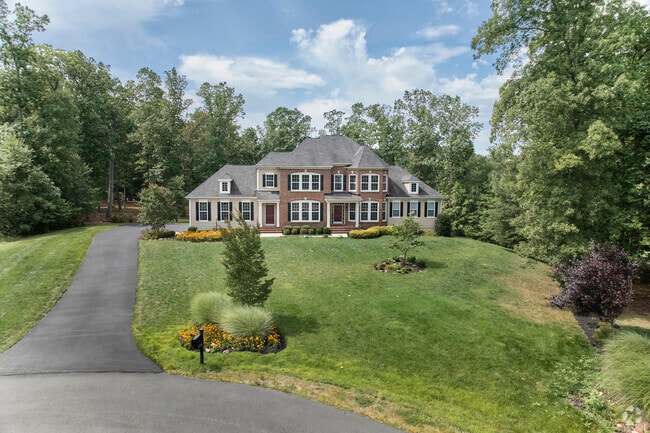 Large custom-built home can be found on hilly terrains in the Bull Run Mountain Estates neighborhood.