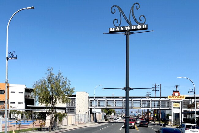 Maywood sign welcomes visitors and residents to the neighborhood.
