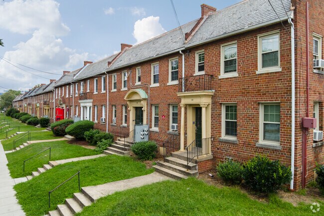 Styles differ in River Terrace row homes, like these colonial-style houses along Clay Pl NE.