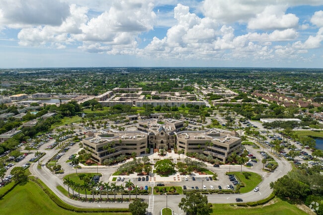 The Forest Hill neighborhood features tree-lined streets and scenic lakefront views.