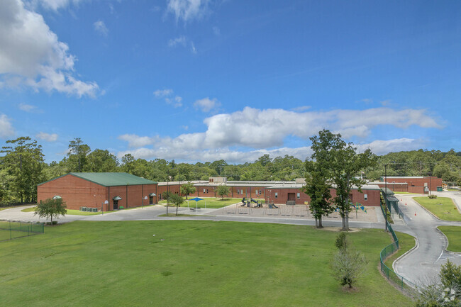 South Conway Elementary School has a large grass area for play in Conway.