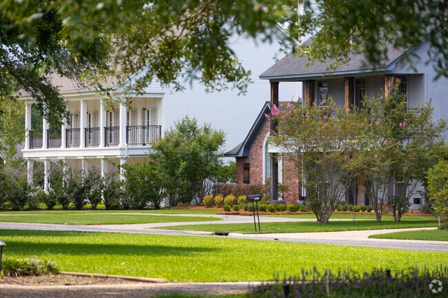 Flowers and green front yards will surround your home in North Monroe.