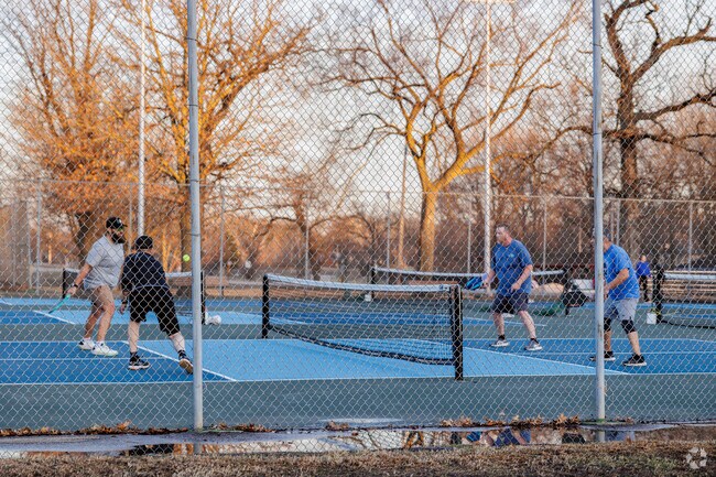 Pittsburg residents gather to play pickleball at Lincoln Park.