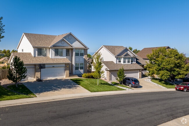 Some large craftsman houses in Saddle Rock Ridge have three-car garages.