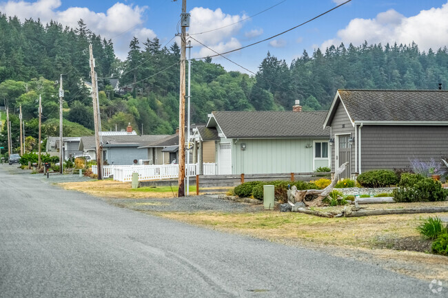 A row of homes along a quiet residential street in Bush Point in Whidbey Island.