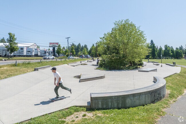 Work on new skateboarding tricks in Lents at the skate park within the Ed Benedict Park.