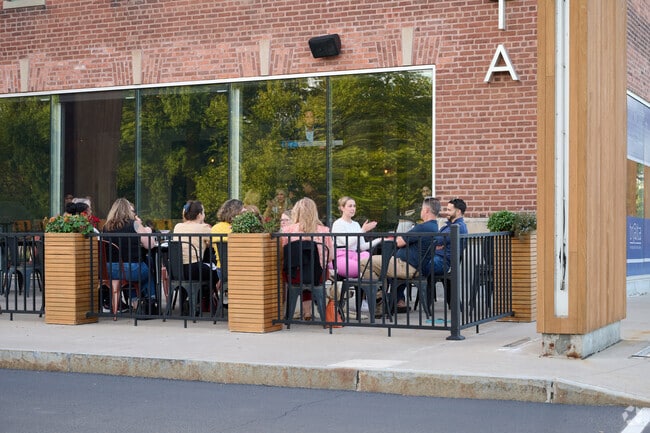 Discover the exquisite dining experience at Trata, situated within the historic Culver Road Armory, where upscale American cuisine awaits to tantalize your taste buds.