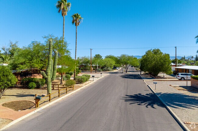 Off-street parking keeps suburban streets wide and calm in Thunderbird-Wilmot Desert Estates.