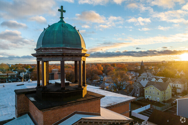 The spire of the St Martin De Porres Academy.