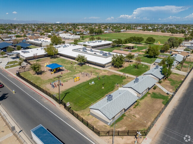 Heatherbrae School has a large campus that includes the main building and smaller outside rooms.