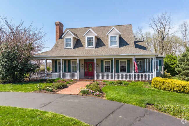 Farmhouses with spacious porches are a hallmark of Sinking Spring’s countryside charm.