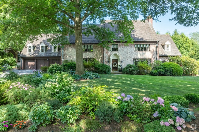 Mansions with beautiful landscaping sit on quiet residential streets in West Lancaster.