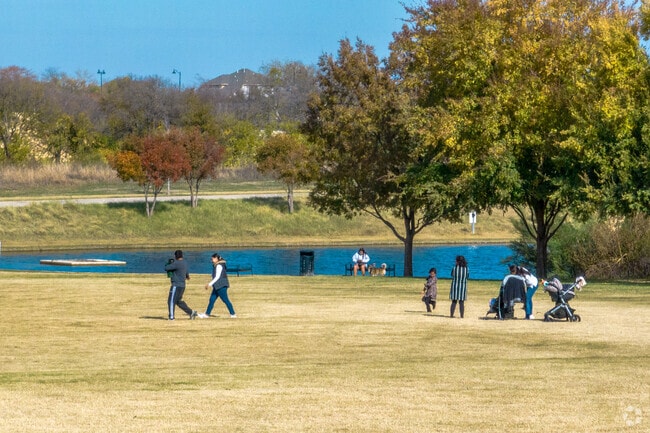 Families enjoy soaking up the sun in Central Park at Union Park in Paloma Creek open spaces.
