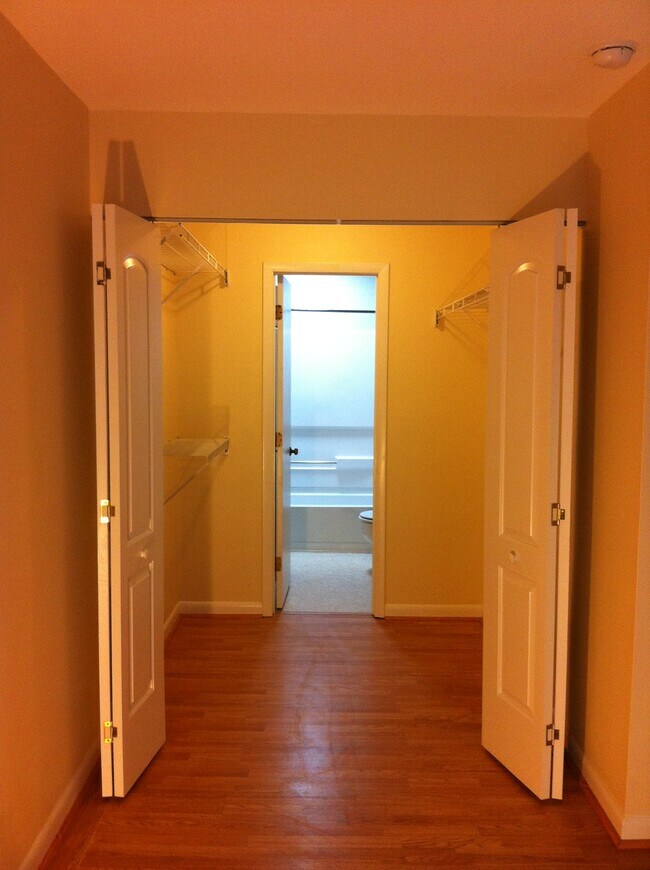 Walk thru master bedroom closet.