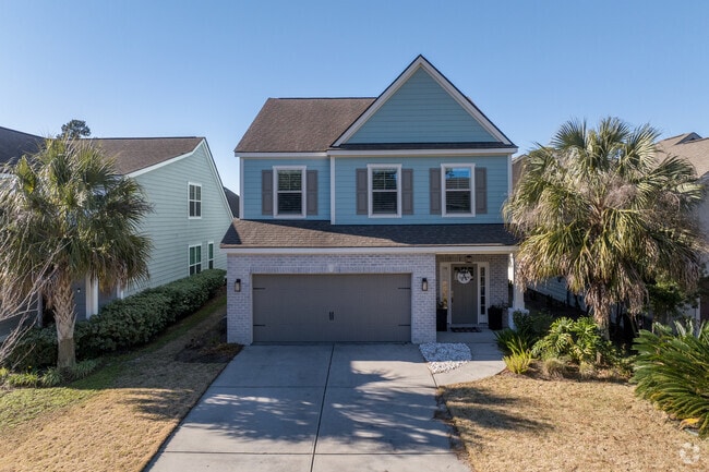 Traditional homes here blend colonial charm with Lowcountry flair.
