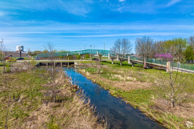 Scenic walkway of the South Creek Greenway Trail through Mark Twain Neighborhood.