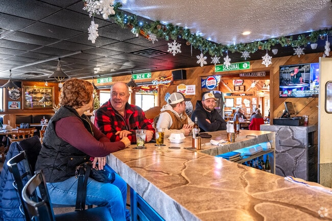Cozy up to the bar at Schmitty's Bar & Grill in Fond du Lac.