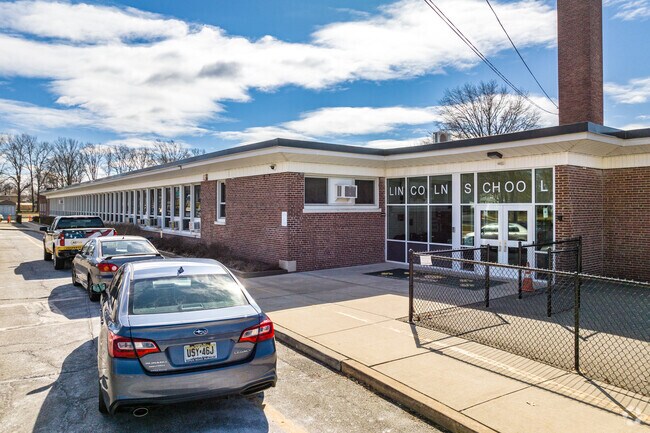 Ground level view of the Lincoln Elementary School entrance in Edison, NJ.