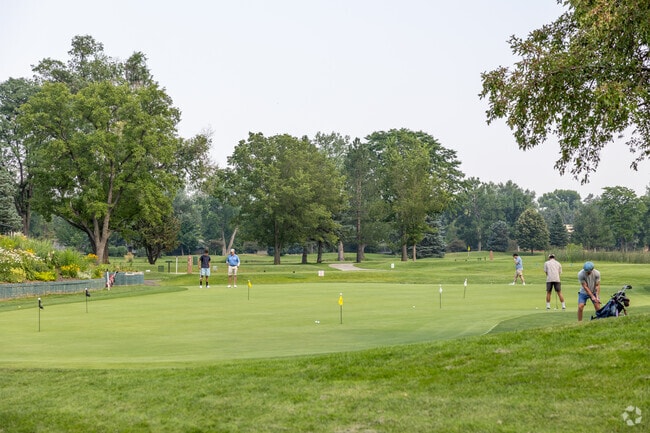 Practice your swing at the inviting driving range in Southeast Boulder’s serene golf courses.