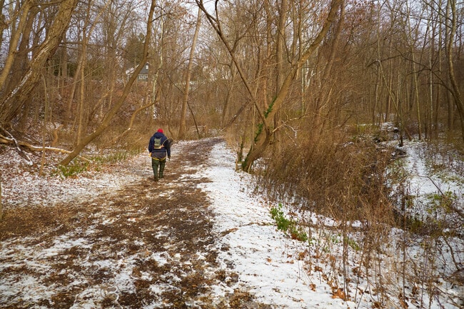 A man prepares to fish at Channing H Philbrick Park in Penfield.