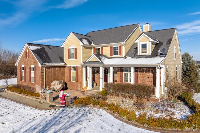 Large estate homes at the Metamora Golf & Country Club offer plenty of room for families of Metamora.