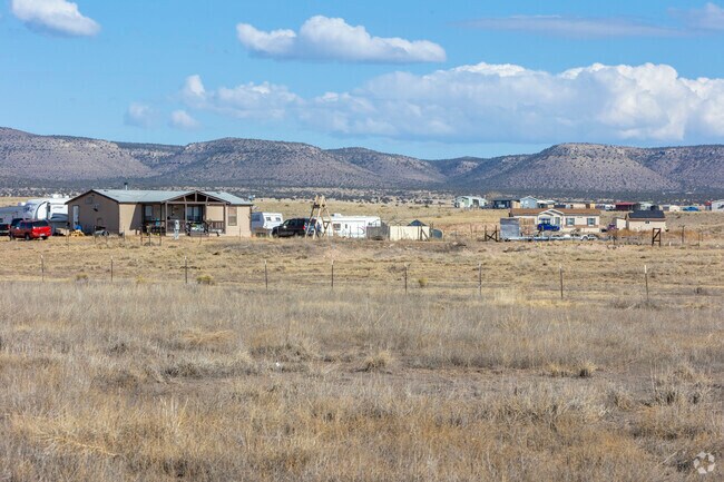 Wide open views of the scenic mountains are right out your back door in Wineglass Acres.