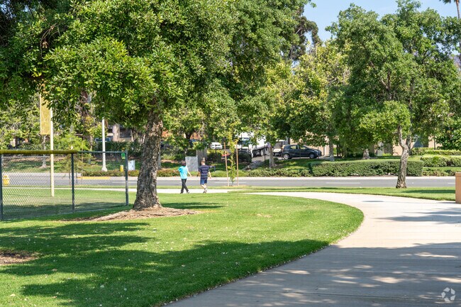 Walking paths run throughout Promenade Community Park for visitors to enjoy a leisurely stroll.