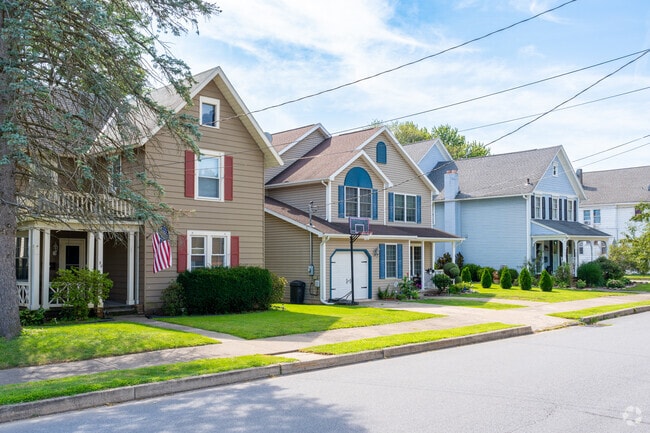 Traditional homes downtown Forty Fort feature colorful designs and sizeable lawns.