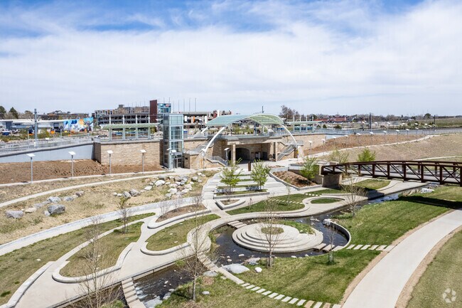 The well-manicured Westminster Station Park in East Westminster, CO, has a river running through it.