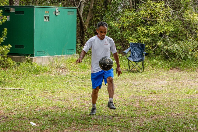 An Empire Point resident is enjoying the parks while he practices juggling.