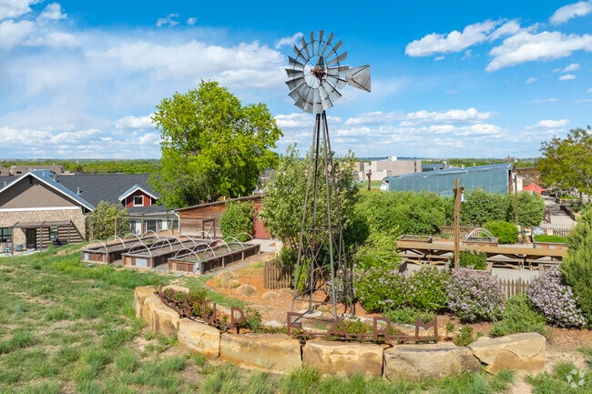 Jessup Farm at Bucking Horse, Colorado, stands as a living tribute to the land’s agrarian roots, where historic barns now house cafes and shops, honoring a working farm heritage while creating space for creativity, community, and fresh experiences.